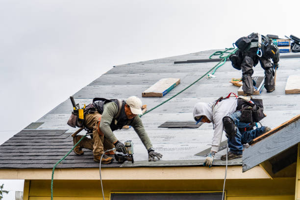Professional Roofing technician working in Dinuba, CA